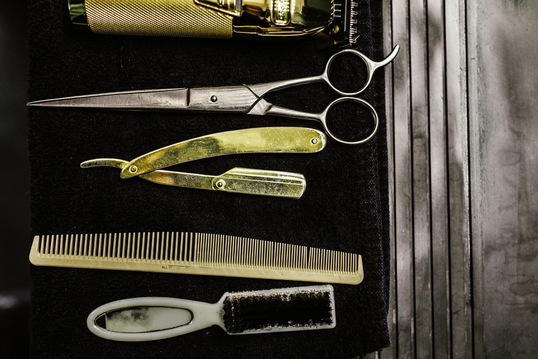 A barber's straight razor and hot-towel tools