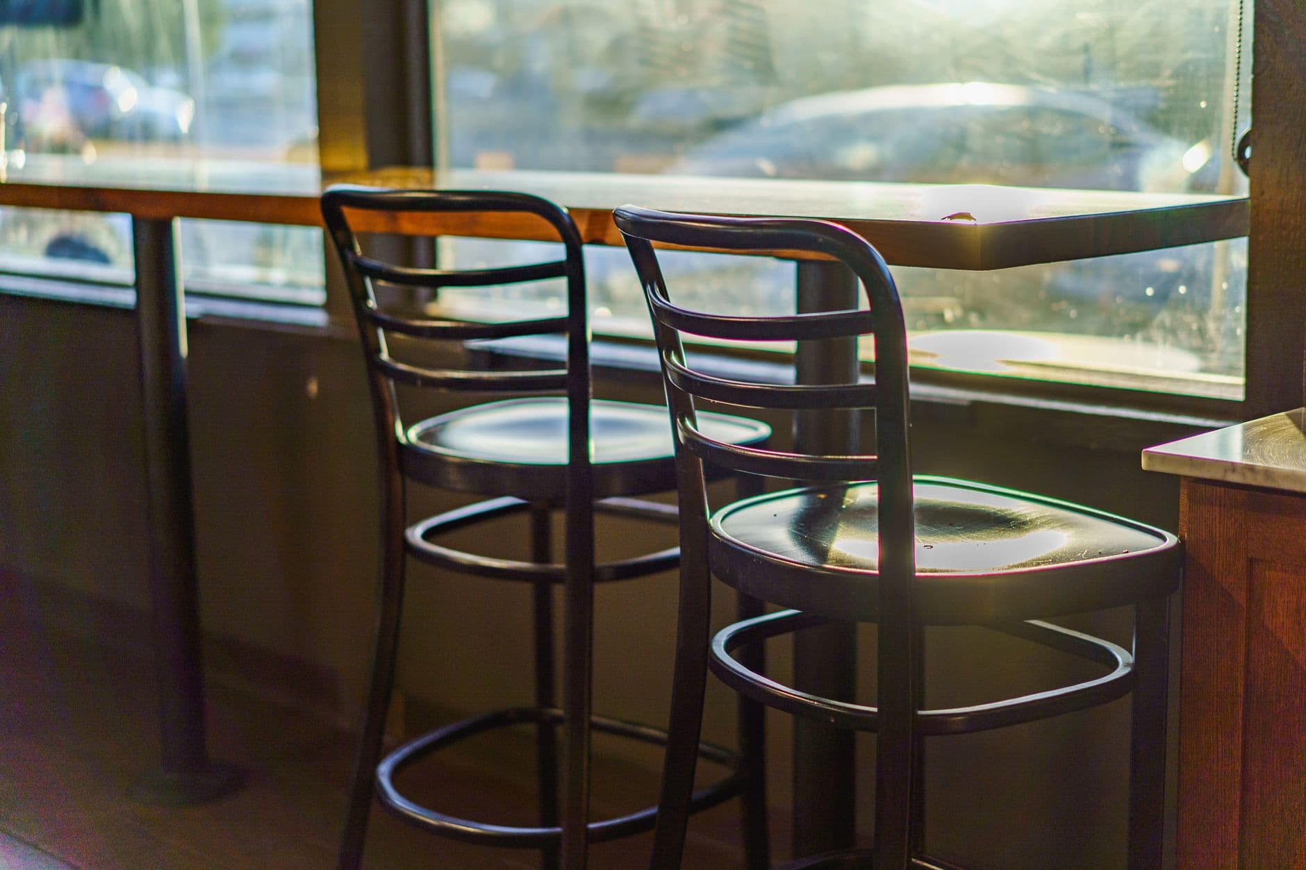 An empty barber chair in early morning light
