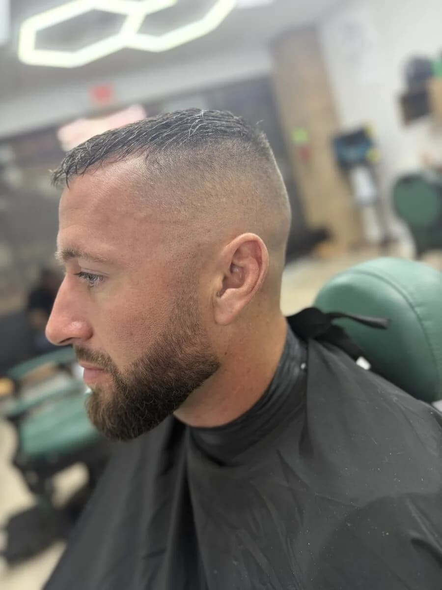 The Blessed Full Service — sharp skin fade with full trimmed beard, Daphne AL
