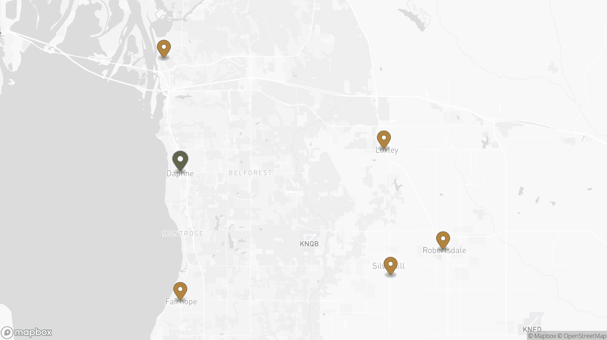 Map of the Eastern Shore and Baldwin County showing Blessed Barbershop in Daphne and the towns it serves — Spanish Fort, Fairhope, Loxley, Silverhill, and Robertsdale